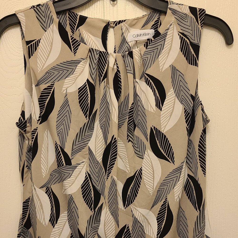 Women’s Calvin Klein short sleeve cream, black, tan & grey pattern blouse